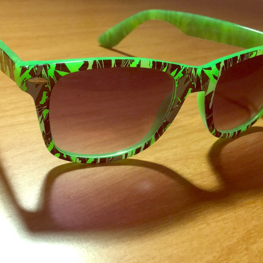 Green sunglasses with gradient lenses